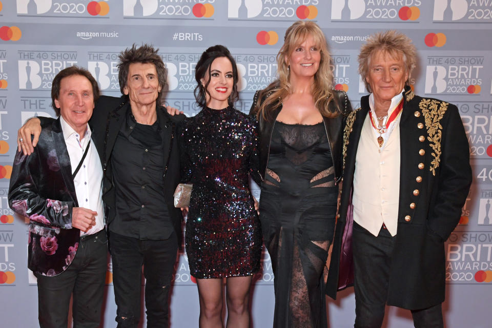 LONDON, ENGLAND - FEBRUARY 18: (EDITORIAL USE ONLY) (L to R) Kenney Jones, Ronnie Wood, Sally Wood, Penny Lancaster and Sir Rod Stewart attend The BRIT Awards 2020 at The O2 Arena on February 18, 2020 in London, England.  (Photo by David M. Benett/Dave Benett/Getty Images)