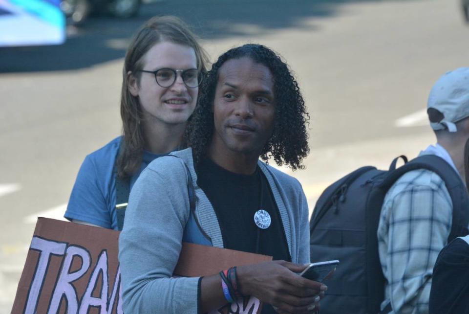 Joel Johnson, a write-in candidate for Bellingham mayor, attends a rally against a sales tax measure to fund a new jail outside the Whatcom County Courthouse on July 11.