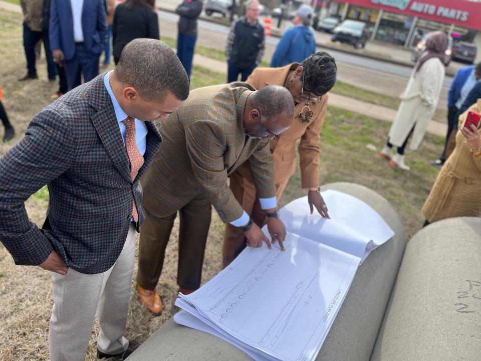 From left, Montgomery Mayor Steven Reed, project engineer Cedric Campbell and City Councilor Franetta Riley review plans for West Fairview Avenue construction.