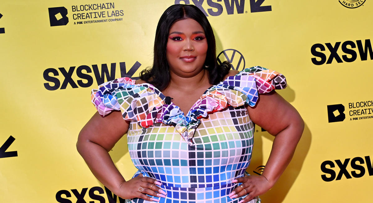 Lizzo keeps cool on flight with thong shapewear as she teases