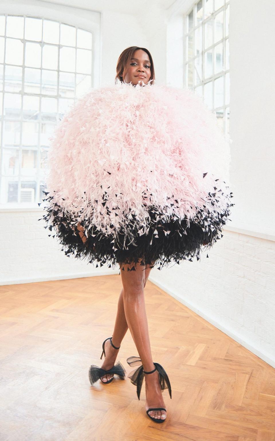 Oti wears: feather dress, price on request, Halpern; Suede and crystal shoes, £1,850, Jimmy Choo  - Christopher Fenner