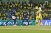 Chennai Super Kings' Captain Ruturaj Gaikwad plays a shot as Lucknow Super Giants' captain KL Rahul watches during the Indian Premier League cricket match between Chennai Super Kings and Lucknow Super Giants in Chennai, India, Tuesday, April 23, 2024. (AP Photo/R.Parthiban)