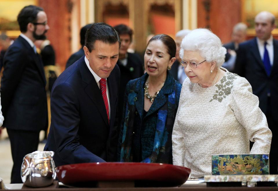 The President of Mexico Enrique Pena Nieto is shown Mexican items in the Royal Collection by Britain's Queen Elizabeth at Buckingham Palace, London