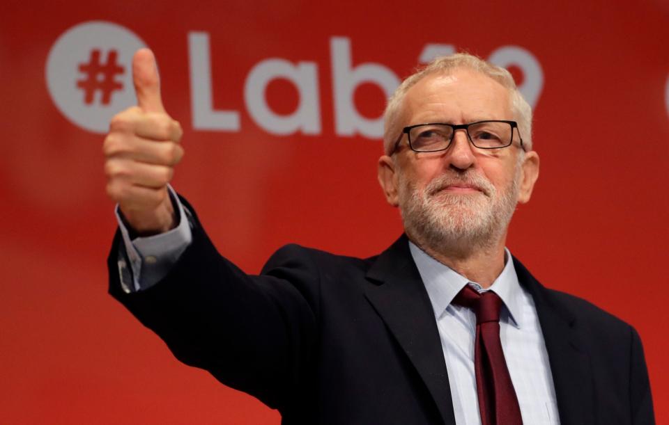 Jeremy Corbyn reacts to the news with a thumbs up (AP)