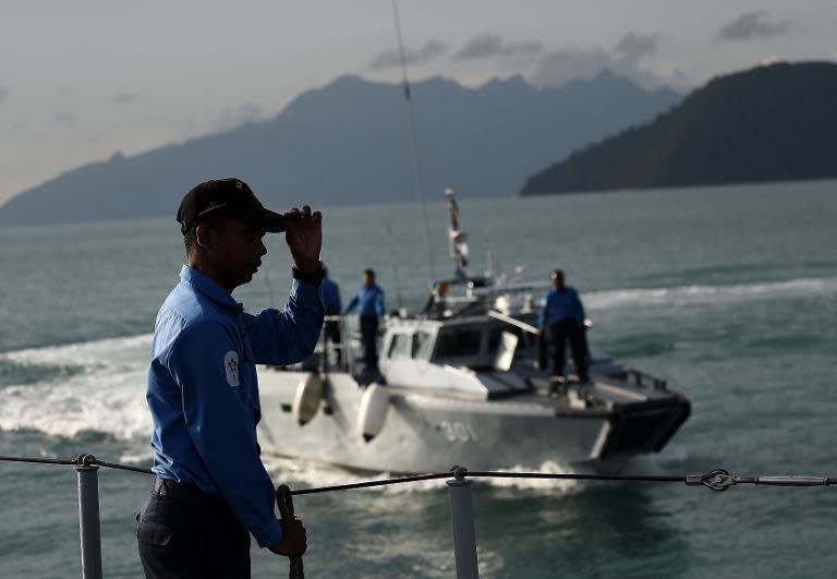 The Royal Malaysian Navy takes part in a search and rescue mission for boatpeople, near the Thai-Malaysia border north of Langkawi island on May 28, 2015