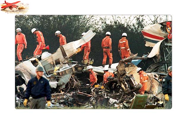 Self Defence Force personnel shown in a file photo dated 27 April 1994 investigating debris of the ill-fated China Airlines Airbus A300-600R flight from Taipei that crashed before landing at Nagoya Internationl Airport.