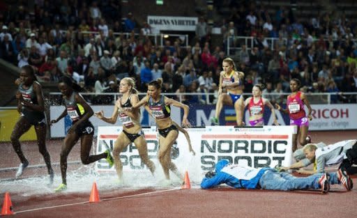 Athletes compete during the women's 3000m steeplechase race of the DN Galan Diamond League athletics meeting at the Stockholm Olympic Stadium. Yuliya Zaripova clocked a season's best time of 9min 05.02sec to win