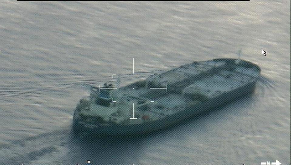 A still image from video taken by a U.S. Coast Guard HC-144 Ocean Sentry aircraft shows the oil tanker United Kalavyrta (also known as the United Kalavrvta), which is carrying a cargo of Kurdish crude oil, approaching Galveston, Texas July 25, 2014. U.S. authorities are set to seize a cargo of oil from Iraqi Kurdistan anchored off the Texas coast after a judge approved a request from Baghdad, raising the stakes in an oil sales dispute between Iraq's central government and the autonomous region. The tanker United Kalavryta, carrying some 1 million barrels of Iraqi Kurdish crude oil worth more than $100 million, arrived near Galveston Bay on Saturday, but has yet to unload its disputed cargo. Picture taken July 25, 2014. REUTERS/US Coast Guard/handout via Reuters (UNITED STATES - Tags: ENERGY TRANSPORT POLITICS CRIME LAW) FOR EDITORIAL USE ONLY. NOT FOR SALE FOR MARKETING OR ADVERTISING CAMPAIGNS. THIS IMAGE HAS BEEN SUPPLIED BY A THIRD PARTY. IT IS DISTRIBUTED, EXACTLY AS RECEIVED BY REUTERS, AS A SERVICE TO CLIENTS