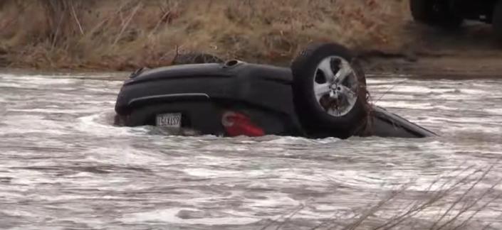 San Bernardino County Fire and other agencies responded on Friday to reports of a vehicle upside down in the high and fast-flowing Mojave River in Hesperia.