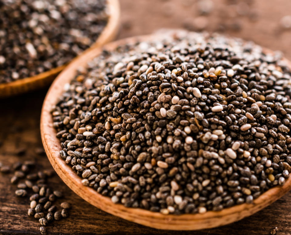 Chia seeds in wooden bowl