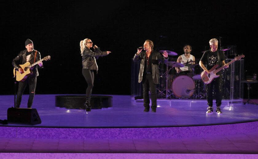 Lady Gaga and U2 onstage during a show in Las Vegas