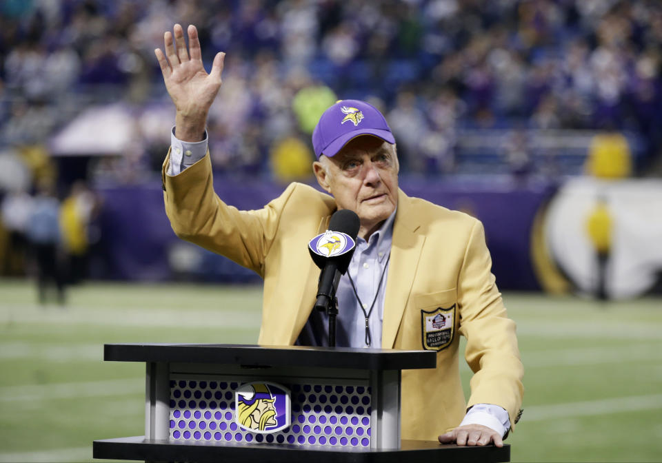 Former Minnesota Vikings Hall of Fame coach Bud Grant waves a final goodbye to the Metrodome during ceremonies following the Vikings NFL football against the Detroit Lions, Sunday, Dec. 29, 2013, in Minneapolis. Grant, the stoic and demanding Hall of Fame coach who took the Minnesota Vikings and their mighty Purple People Eaters defense to four Super Bowls in eight years and lost all of them, has died. He was 95. (AP Photo/Jim Mone, File