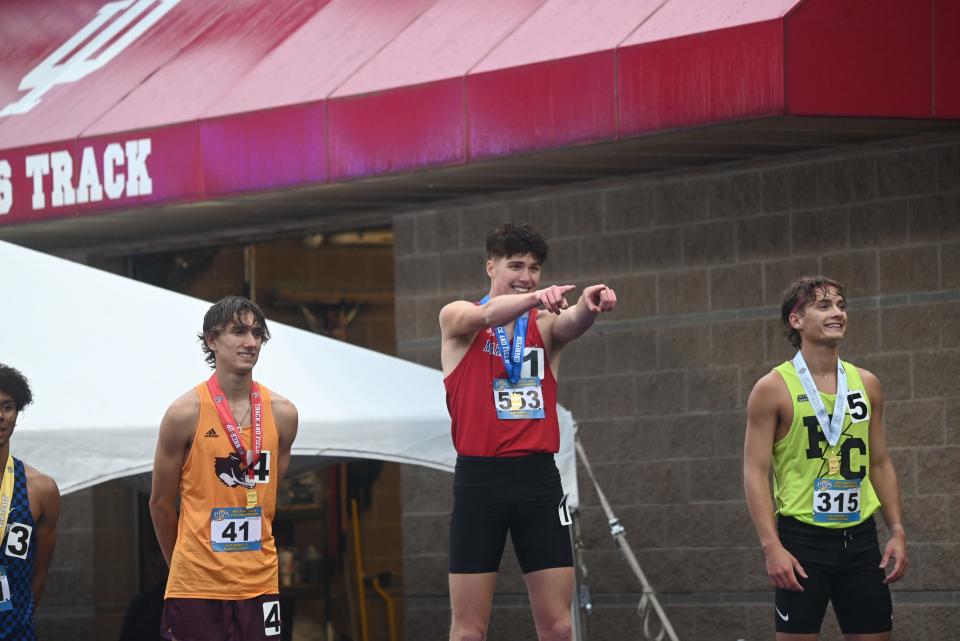 Martinsville’s Martin Barco celebrates a win in the 800m race during the IHSAA Boys State Track & Field Finals at the Robert C. Haugh Track & Field Complex on the campus of Indiana University in Bloomington on Saturday, June 1, 2024.