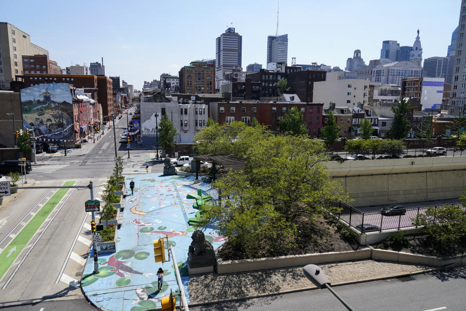 Shown is a bridge on 10th Street that spans Interstate 676 that bisects the Chinatown neighborhood of Philadelphia, Friday, July 22, 2022. Organizers and members of Philadelphia's Chinatown say they were surprised by the 76ers' announcement that they hope to build a $1.3 billion arena just a block from the community’s gateway arch. (AP Photo/Matt Rourke)