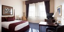 <p>This <a href="https://go.redirectingat.com?id=74968X1596630&url=https%3A%2F%2Fwww.tripadvisor.com%2FHotel_Review-g39143-d92201-Reviews-Hotel_at_Old_Town-Wichita_Kansas.html&sref=https%3A%2F%2Fwww.redbookmag.com%2Fabout%2Fg34149750%2Fmost-historic-hotels%2F" rel="nofollow noopener" target="_blank" data-ylk="slk:Wichita hotel;elm:context_link;itc:0;sec:content-canvas" class="link ">Wichita hotel</a>, a handsome four-story redbrick building with white trim, is one of Kansas' most historic hotels. Built in 1906, it once served as a warehouse facility for the Keen Kutter tool company, and many antique tools are on display throughout the hotel's public spaces. </p>