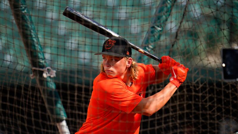 Jackson Holliday, the first overall draft pick by the Baltimore Orioles in the 2022 draft, participates in batting practice prior to a baseball game between the Baltimore Orioles and the Tampa Bay Rays, Wednesday, July 27, 2022, in Baltimore.