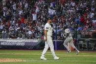 Colorado Rockies pitcher Tyler Kinley reacts as Houston Astros Yordan Alvarez runs the bases after hitting a solo home run during the ninth inning of a baseball game at Alfredo Harp Helu stadium in Mexico City, Saturday, April 27, 2024. (AP Photo/Fernando Llano)