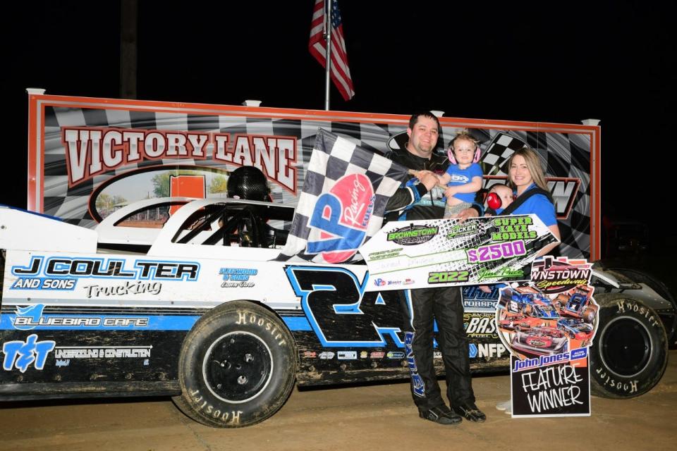 Jared Bailey, his wife Brittany and kids Marin and Knox bask in victory lane on April 23 after Bailey captured the first Super Late Model feature of the season at Brownstown Speedway.