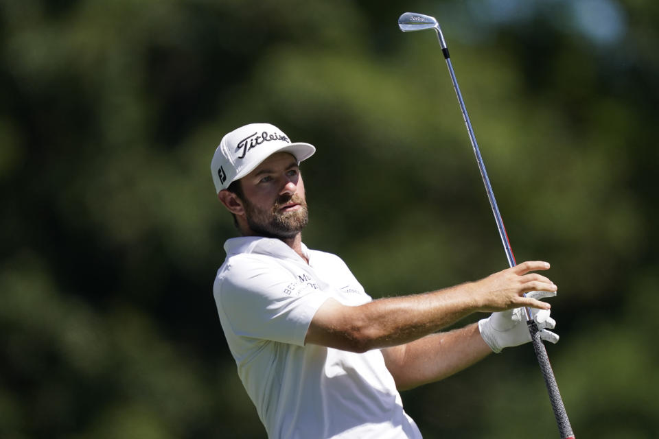 Chris Young drives off the ninth tee during the second round of the Rocket Mortgage Classic golf tournament, Friday, July 29, 2022, in Detroit. (AP Photo/Carlos Osorio)