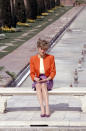 <p>For this infamous photo, taken in front of the Taj Mahal, the Princess teamed a bright orange blazer with a lilac skirt and matching shoes. <i>[Photo: Rex]</i></p>