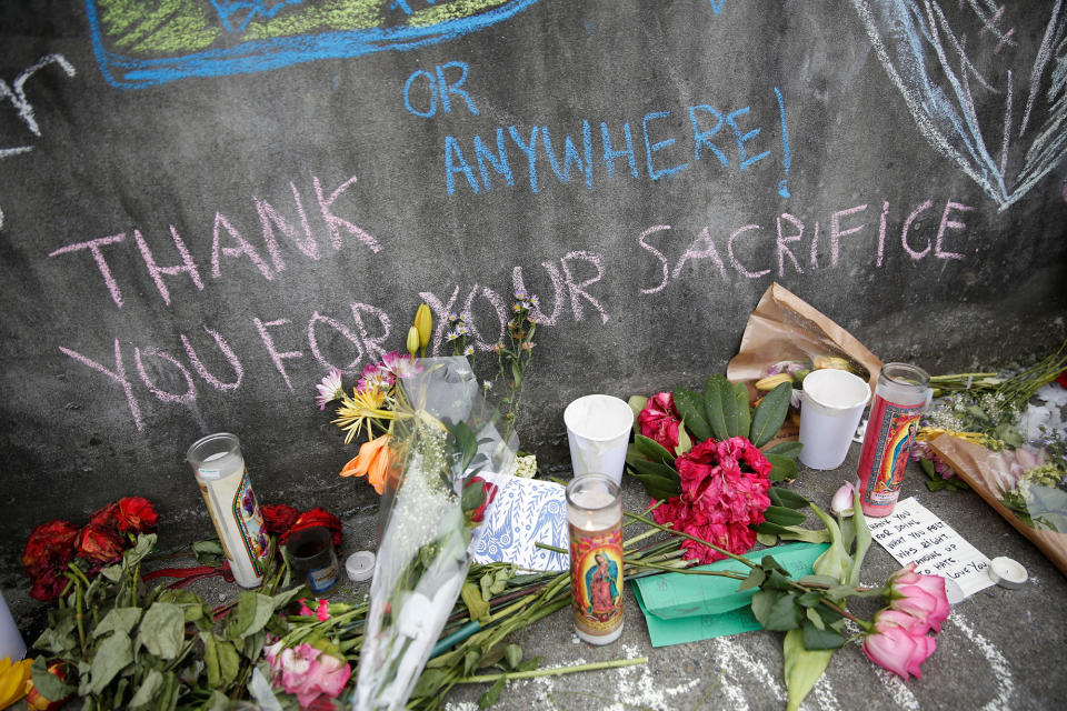 <p>A chalk message is seen at a makeshift memorial for two men who were killed on a commuter train while trying to stop another man from harassing two young women who appeared to be Muslim, in Portland, Ore., May 29, 2017. (Terray Sylvester/Reuters) </p>