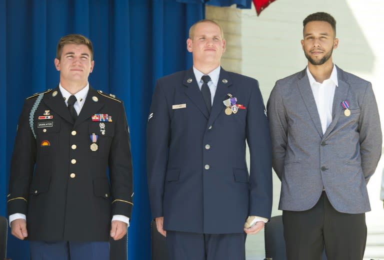 L-R: Army Specialist Alek Skarlatos, Airman 1st Class Spencer Stone and Anthony Sadler stand after receiving awards for their roles in disarming a gunman on a Paris-bound train last month during a ceremony at the Pentagon on September 17, 2015