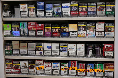 Cigarette packs are seen at a store in Madrid, Spain, December 2, 2016. REUTERS/Andrea Comas