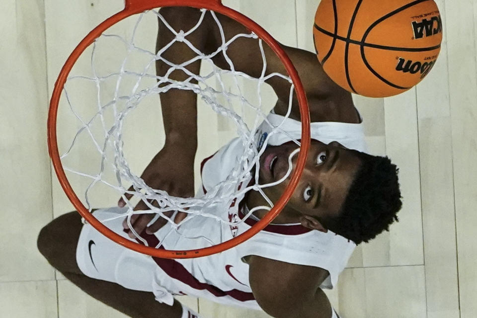 Alabama forward Brandon Miller (24) watches his shot against San Diego State in the second half of a Sweet 16 round college basketball game in the South Regional of the NCAA Tournament, Friday, March 24, 2023, in Louisville, Ky. (AP Photo/John Bazemore)