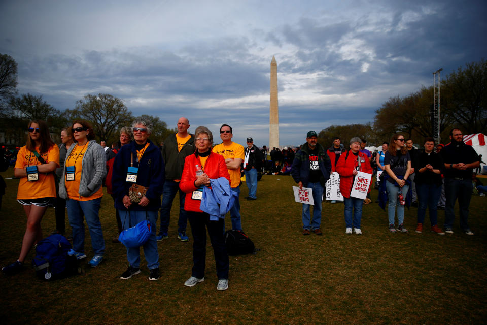 <p>Attendees are seen during a silent march and rally on the National Mall to mark the 50th anniversary of the assassination of slain civil rights leader Rev. Martin Luther King Jr. in Washington, April 4, 2018. (Photo: Eric Thayer/Reuters) </p>