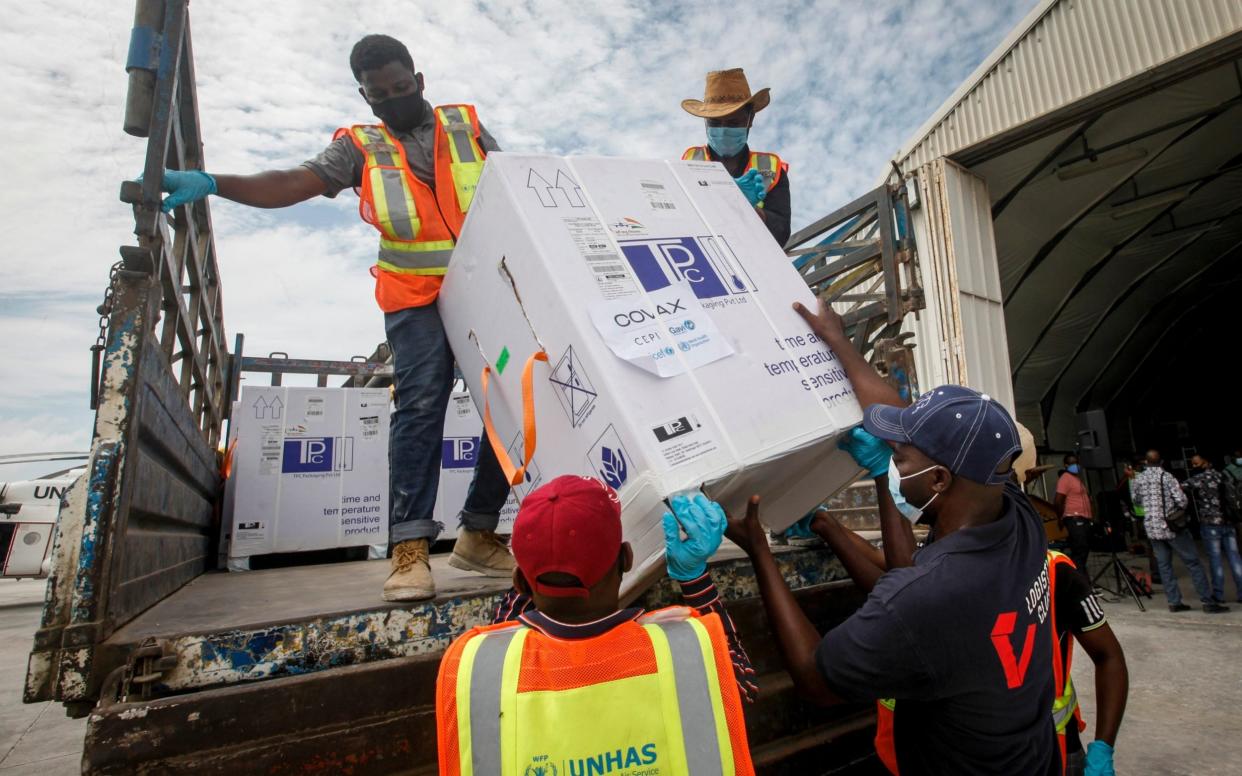 Vaccines sent as part of the Covax programme arriving in Mogadishu, Somalia, in March. The West is being urged to step up the distribution of jabs  - AP