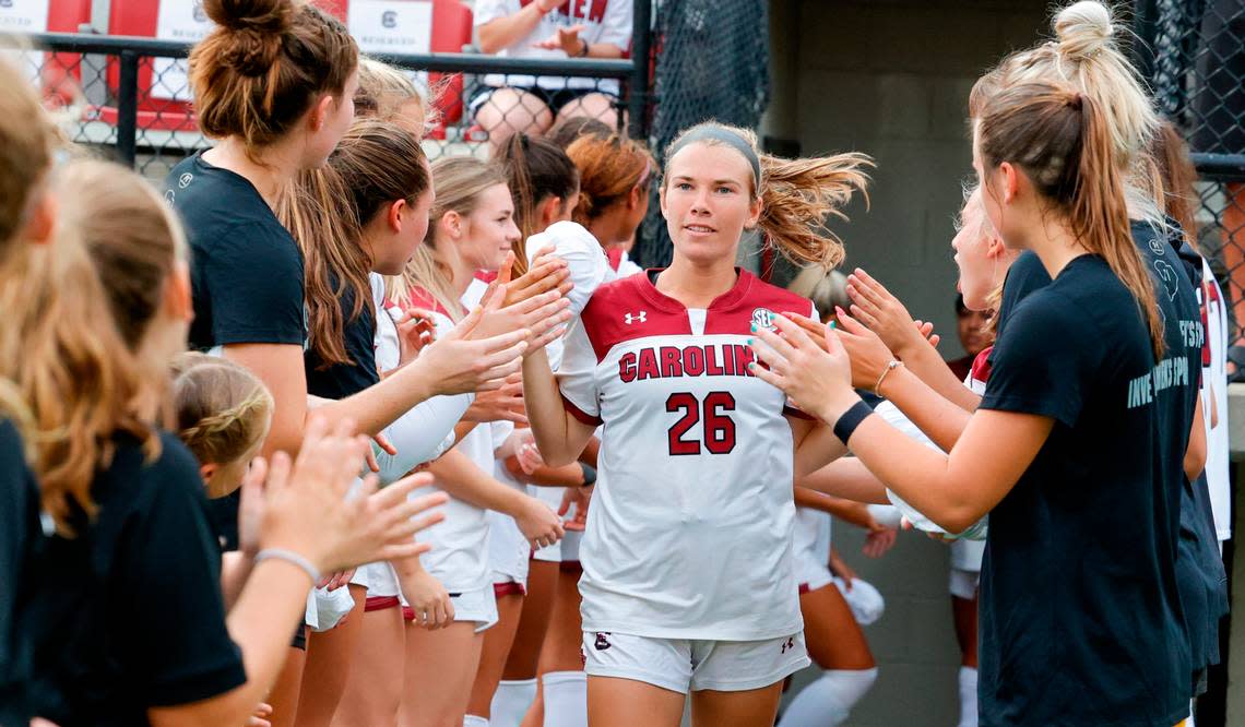 Claire Griffiths enters the field to play Florida State University at Eugene Stone Stadium on Aug. 18, 2022