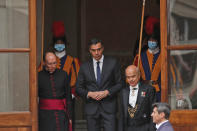 Spain's Prime Minister Pedro Sanchez, center, leaves the San Damaso courtyard after his meeting with Pope Francis, at the Vatican, Saturday, Oct. 24, 2020. (AP Photo/Alessandra Tarantino)