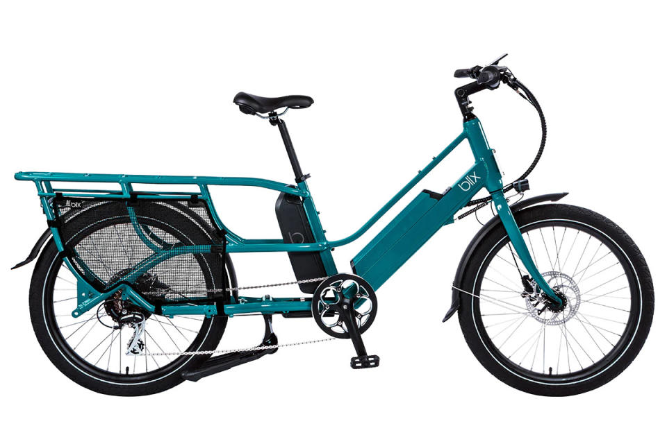 <p>Blix Bike</p>Blix Packa Genie<ul><li>Battery Power: 1228 Wh (dual 614 Wh option)</li><li>Motor Power: 750W hub motor</li><li>Range: Up to 80 miles</li><li>Payload: 400-450lbs</li><li>Class 2 (up to 20 mph with throttle)</li></ul><p>The Blix Packer Genie redefines the cargo biking experience with its cutting-edge design and formidable features. Its dual battery system, boasting a total of 1228Wh (dual 614Wh option), coupled with a powerful 750W hub motor, propels it to an unmatched range of up to 80 miles. T</p><p>This cargo bike isn't just about power—it's smart too. With smart mounting points for racks, the Packer Gebnie allows for an additional 200 lbs of gear, enhancing its utility for various hauling needs. With a payload capacity of 400-450 lbs, you can transport both heavy cargo and extra essentials. </p><p>As a Class 2 e-bike, reaching speeds up to 20 mph with throttle assistance, the Blix Packer Genie stands out as a versatile and high-performing option with an unmatched range in the electric cargo bike market.</p>