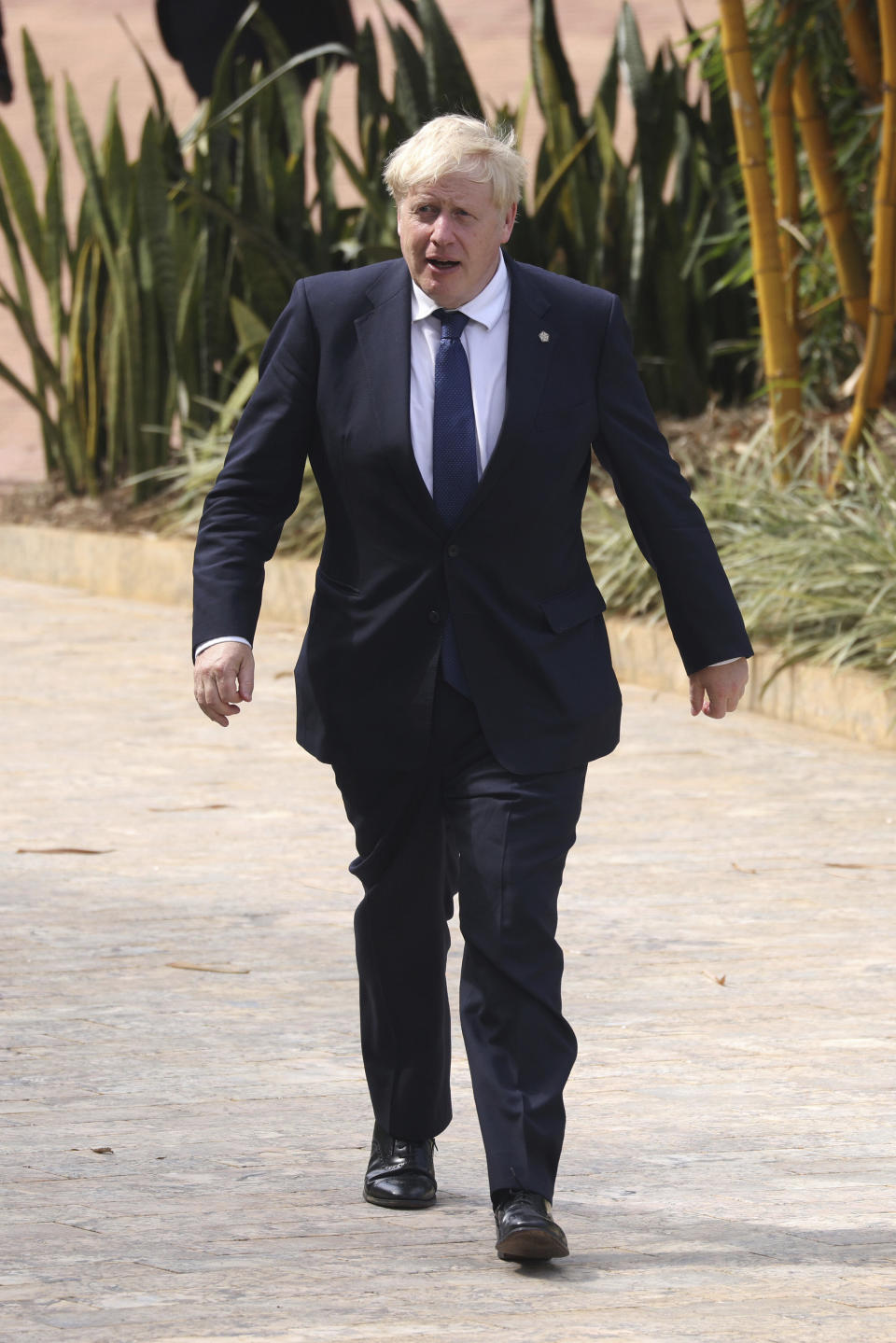 Britain's Prime Minister Boris Johnson arrives for the Leaders' Retreat on the sidelines of the Commonwealth Heads of Government Meeting at Intare Conference Arena in Kigali, Rwanda, Saturday, June 25, 2022. (Dan Kitwood/Pool Photo via AP)