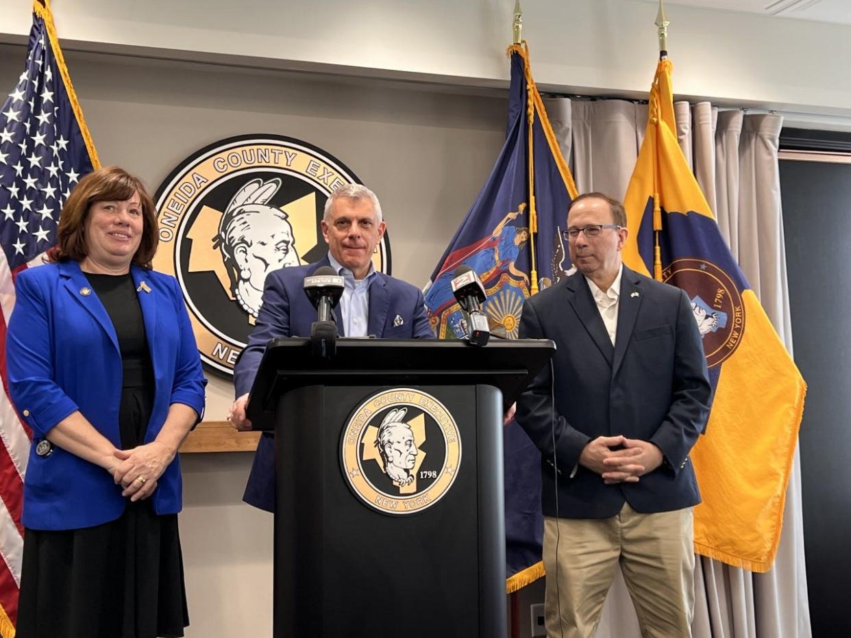 Oneida County Executive Anthony Picente Jr., center, speaks Friday during a press conference on the possibility of New York Gov. Kathy Hochul sending sending immigrants to state owned properties in the county. He is flanked on the left by state Assemblywoman Marianne Buttenschon and on the right by state Senator Joseph Griffo.