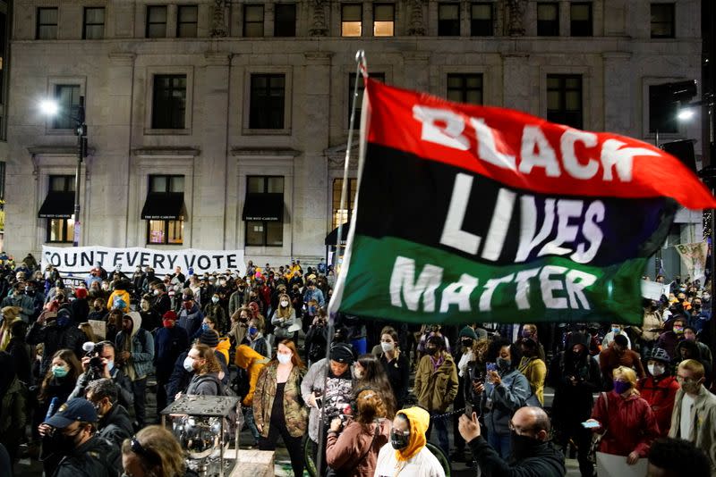 People gather after a rally demanding a fair count of the votes of the 2020 U.S. presidential election, in Philadelphia