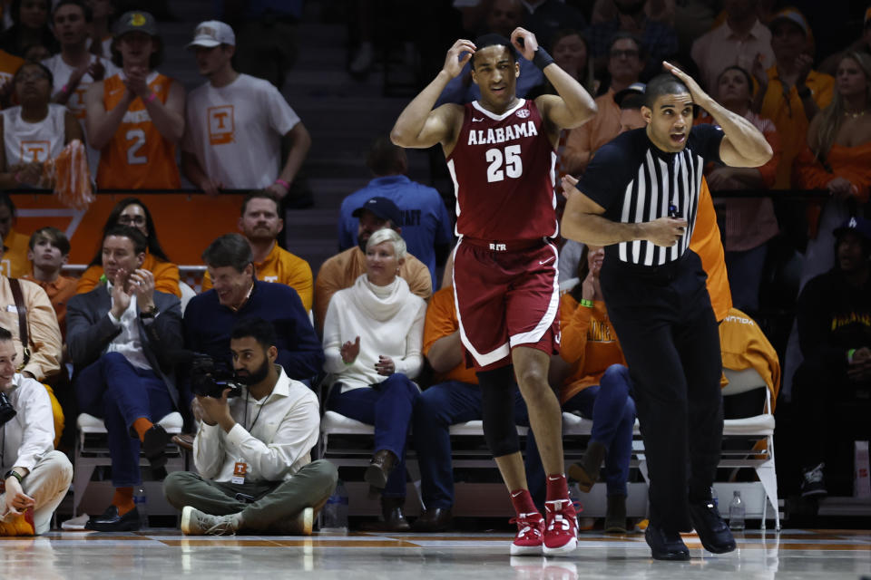 Alabama guard Nimari Burnett (25) reacts to being called for a foul during the second half of an NCAA college basketball game against Alabama, Wednesday, Feb. 15, 2023, in Knoxville, Tenn. (AP Photo/Wade Payne)