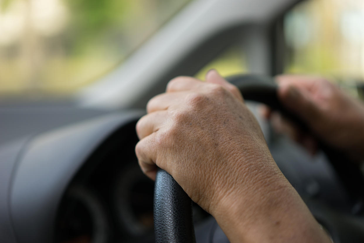 A driver behind the wheel.