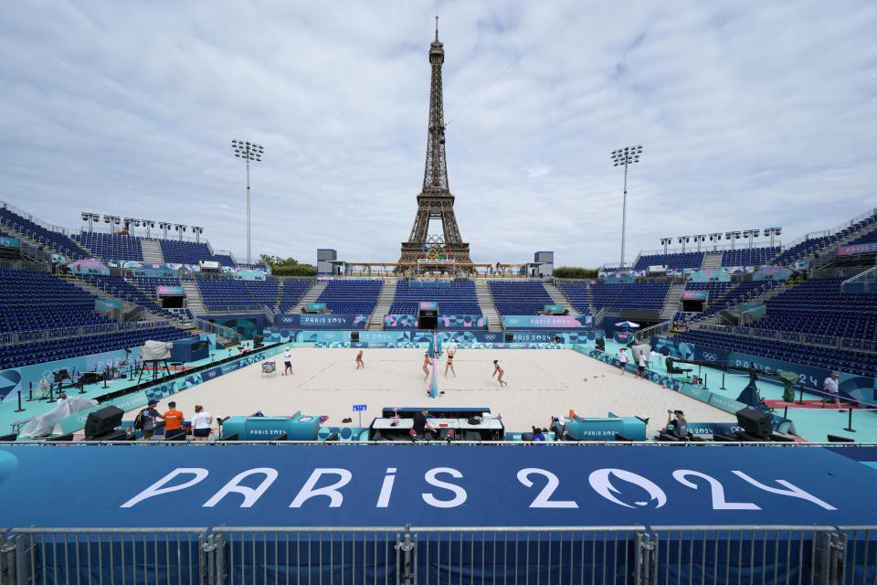 Players from the Netherlands, left, and Switzerland, practice beach volleyball at the 2024 Summer Olympics, Thursday, July 25, 2024, in Paris, France. (AP Photo/Robert F. Bukaty)