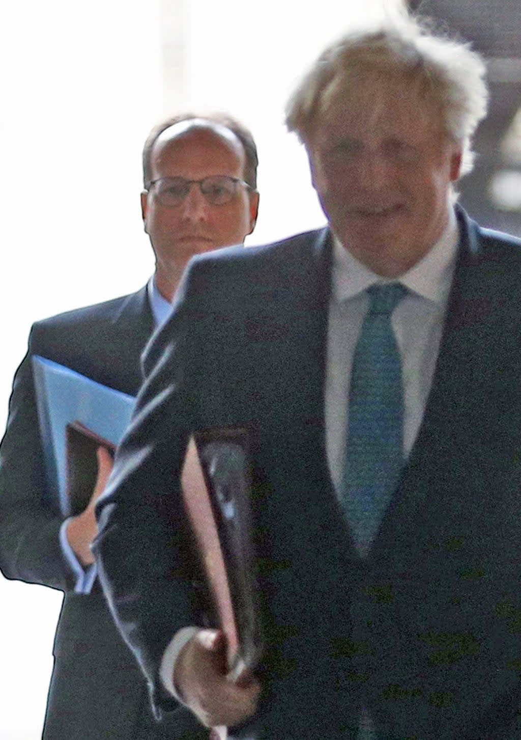 Martin Reynolds (left) and Boris Johnson walking back to Downing Street after a cabinet meeting (PA Wire)