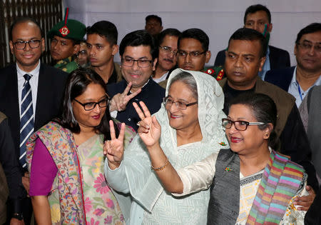 Prime Minister Sheikh Hasina gestures after casting her vote in the morning during the general election in Dhaka, Bangladesh, December 30, 2018. Bangladesh Sangbad Sangstha/Handout via REUTERS