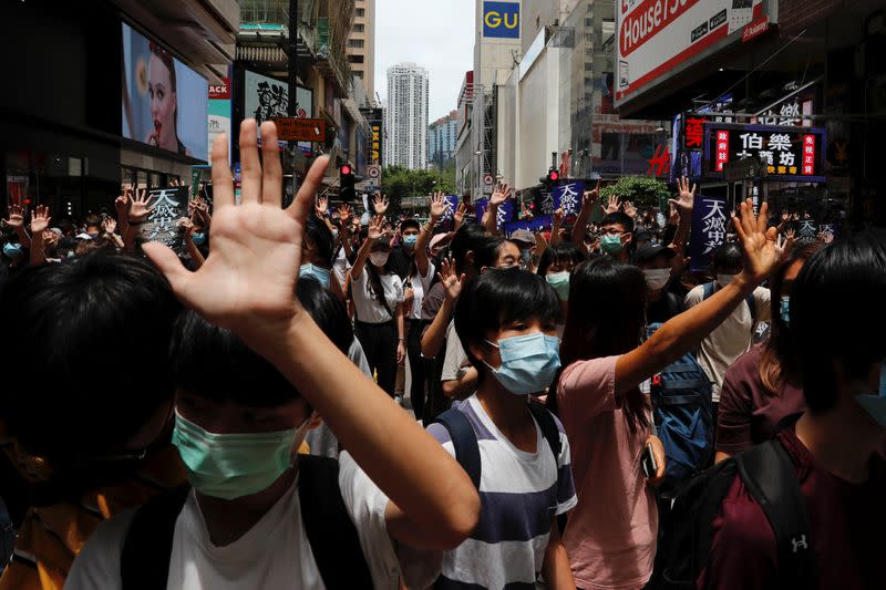 Anti-government protesters march again Beijing's plans to impose national security legislation in Hong Kong