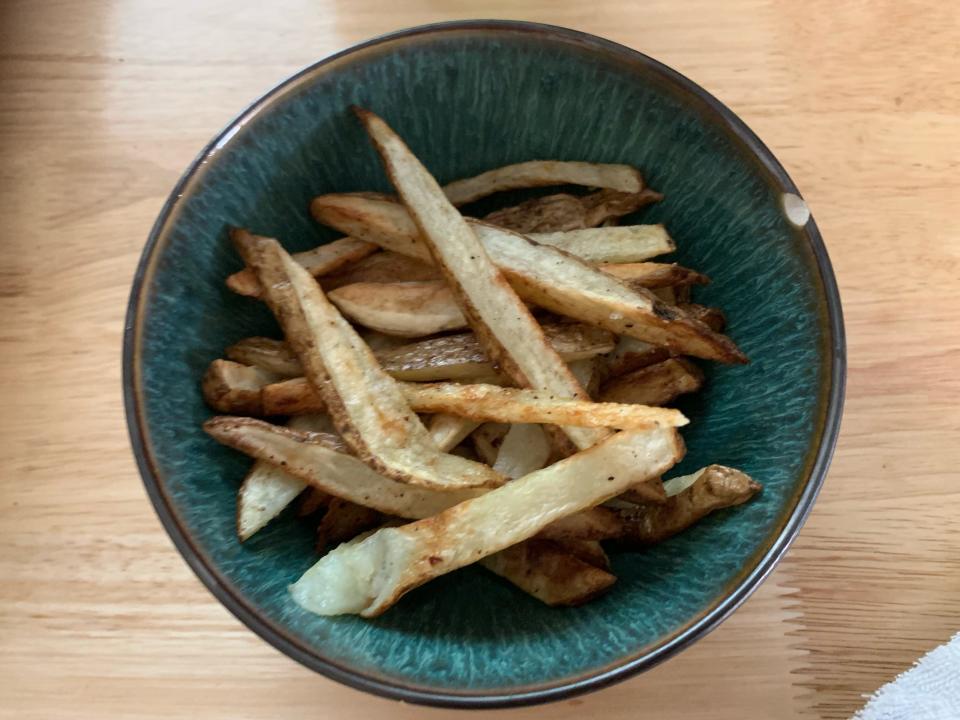 French fries in a blue bowl