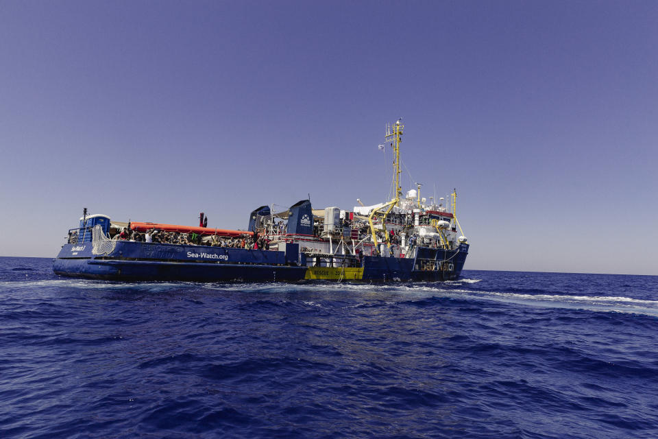 The German charity Sea-Watch 3 with 444 people on board in the central Mediterranean on Sunday, July 24, 2022. Ships in the Mediterranean Sea have rescued over 1,100 people struggling to reach Europe in rickety smugglers boats and found five bodies. The Italian Coast Guard says Sunday that Italian vessels recovered the bodies Saturday as it rescued 674 people packed on a fishing boat adrift in the Mediterranean off the Libyan coast. (Nora Boerding/Sea-Watch via AP)