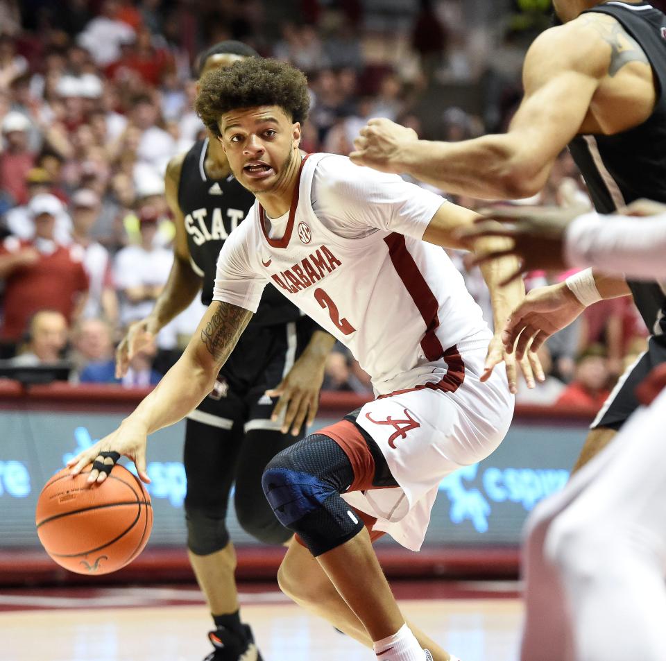Alabama forward Darius Miles (2) tries to get into the lane against Mississippi State Wednesday, February 16, 2022, at Coleman Coliseum in Tuscaloosa. Alabama defeated Mississippi State 80-75.