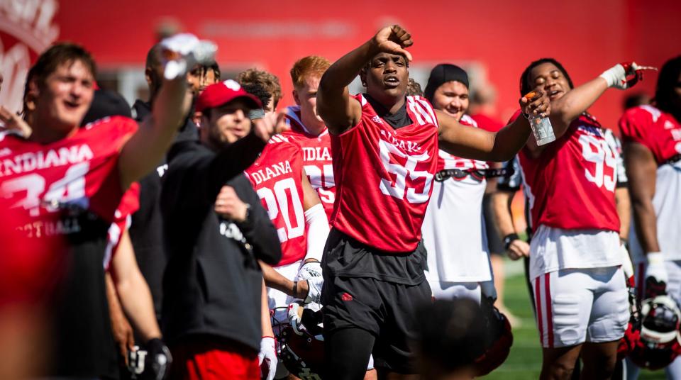 Indiana's Venson Sneed Jr. (55) and the Hoosier defense gives Tayven Jackson (2) a hard time after making a bad pass to a kid during Indiana football's Spring Football Saturday event at Memorial Stadium on Saturday, April 15, 2203.