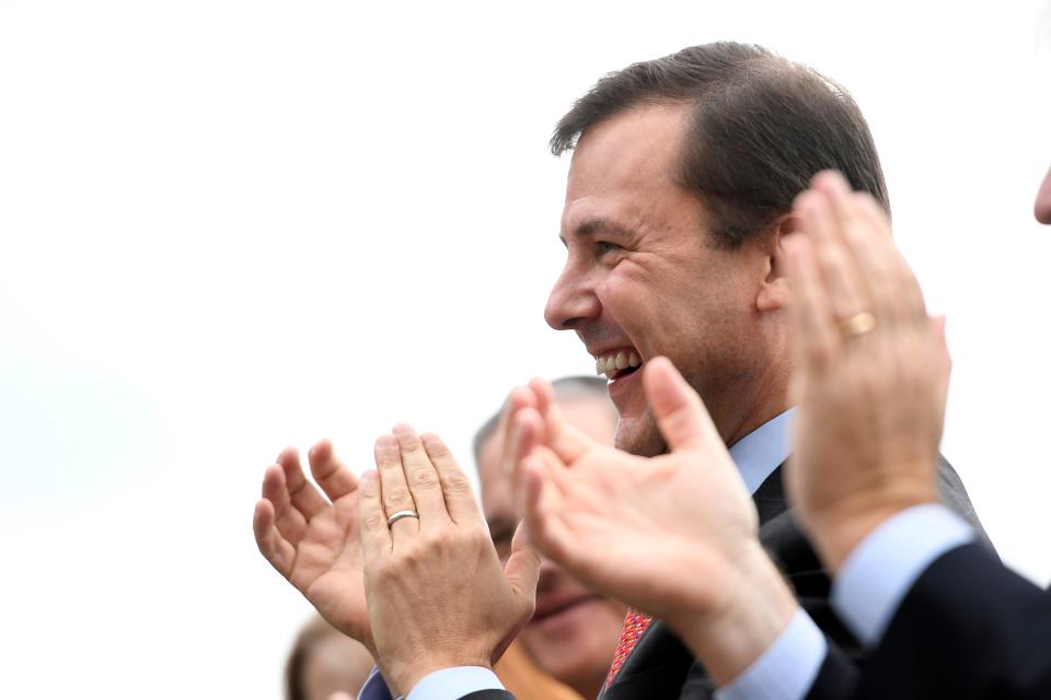 New Jersey Senate Minority Leader Thomas Kean, Jr., applauds Gov. Phil Murphy (not pictured) during an announcement that the Raritan Valley Line's partial "one-seat ride" to New York during off-peak hours is being restored in a press conference at the Westfield NJ Transit station on Monday, Oct. 14, 2019. 