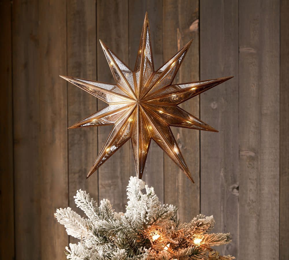 <p><a href="https://go.redirectingat.com?id=74968X1596630&url=https%3A%2F%2Fwww.potterybarn.com%2Fproducts%2Flit-mirrored-star-tree-topper%2F&sref=https%3A%2F%2Fwww.housebeautiful.com%2Fentertaining%2Fholidays-celebrations%2Fg45735039%2Fchristmas-tree-topper-ideas%2F" rel="nofollow noopener" target="_blank" data-ylk="slk:Shop Now;elm:context_link;itc:0;sec:content-canvas" class="link rapid-noclick-resp">Shop Now</a></p><p>Lit Mirrored Star Tree Topper</p><p>potterybarn.com</p><p>$79.00</p>