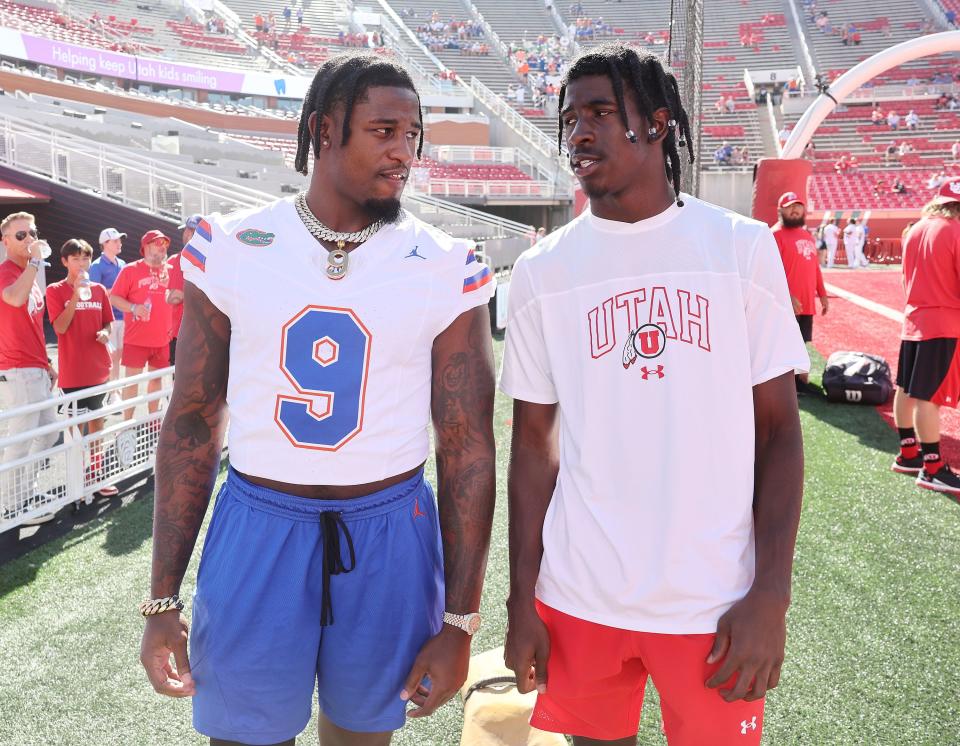 Brother Keon and Daidren Zipperer talk prior to the season opener between the Florida Gators and the Utah Utes in Salt Lake City on Thursday, Aug. 31, 2023. Keon plays tight end for Florida and Daidren is a receiver for Utah. | Jeffrey D. Allred, Deseret News