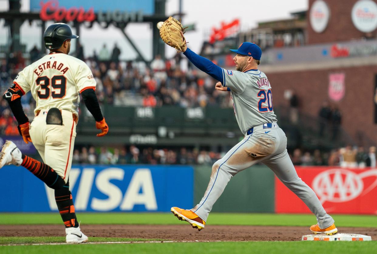San Francisco Giants second baseman Thairo Estrada (39) is forced out by New York Mets first base Pete Alonso (20) during end the third inning on April 22, 2024, at Oracle Park.